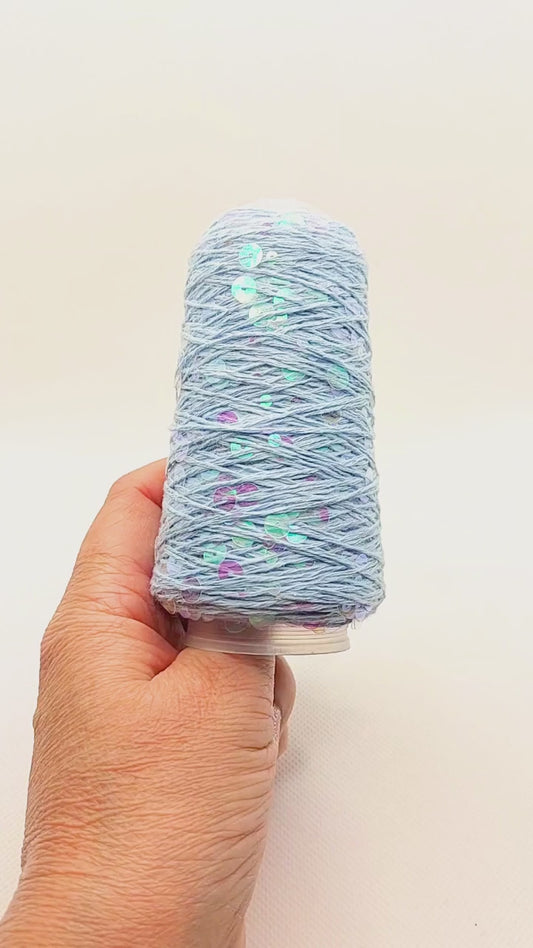 Yarn - 50g - Touch of Sparkle - Light blue with irridescent, transparent sequins
